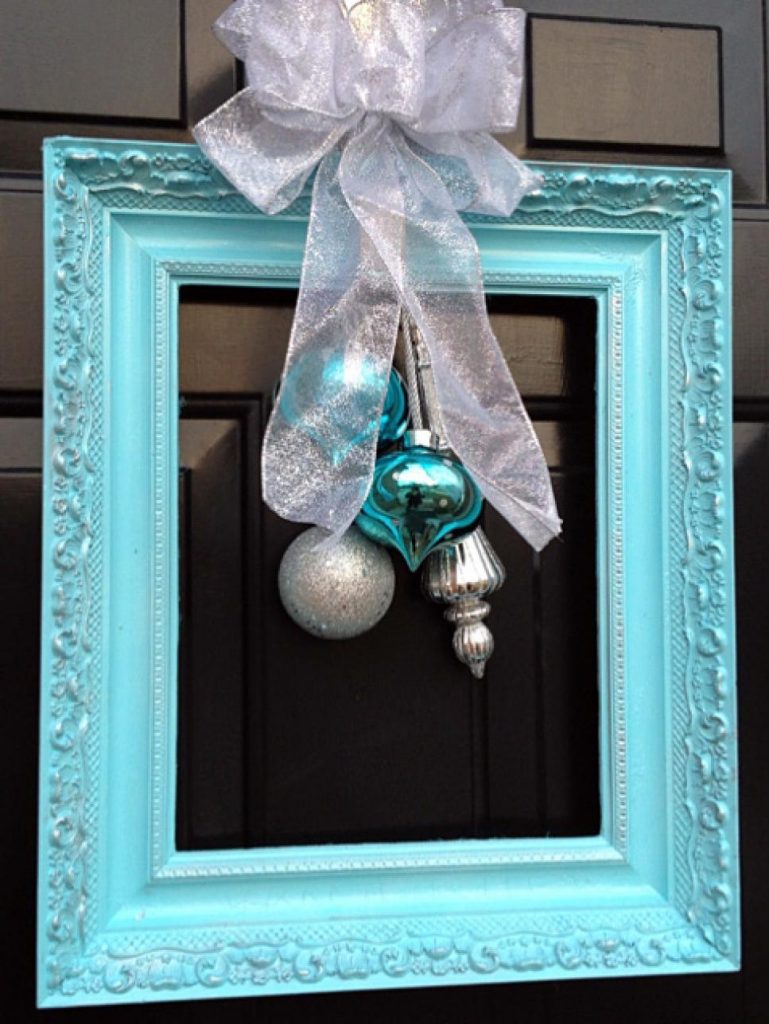 frame with bow and ornaments